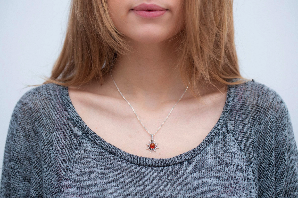 Amber sun pendant deals
