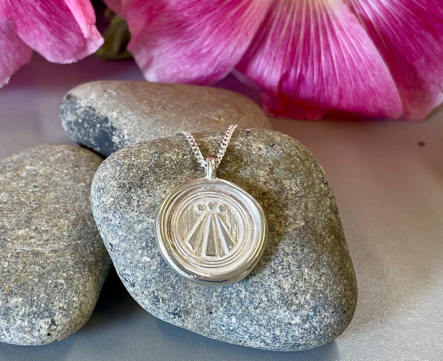 Symbolic Silver Pendants