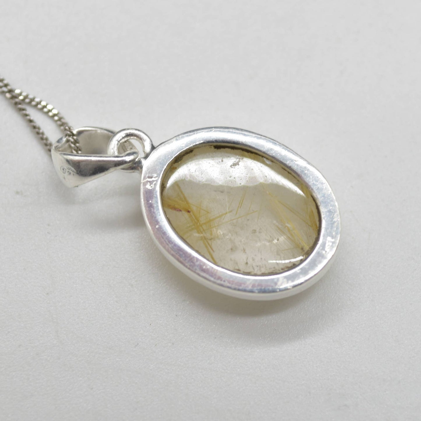 Golden Rutilated Quartz Oval Pendant in Sterling Silver