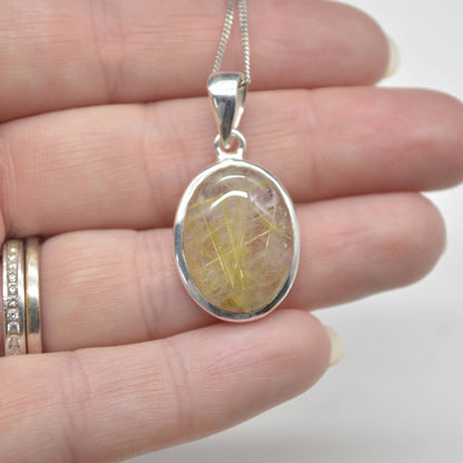 Golden Rutilated Quartz Oval Pendant in Sterling Silver