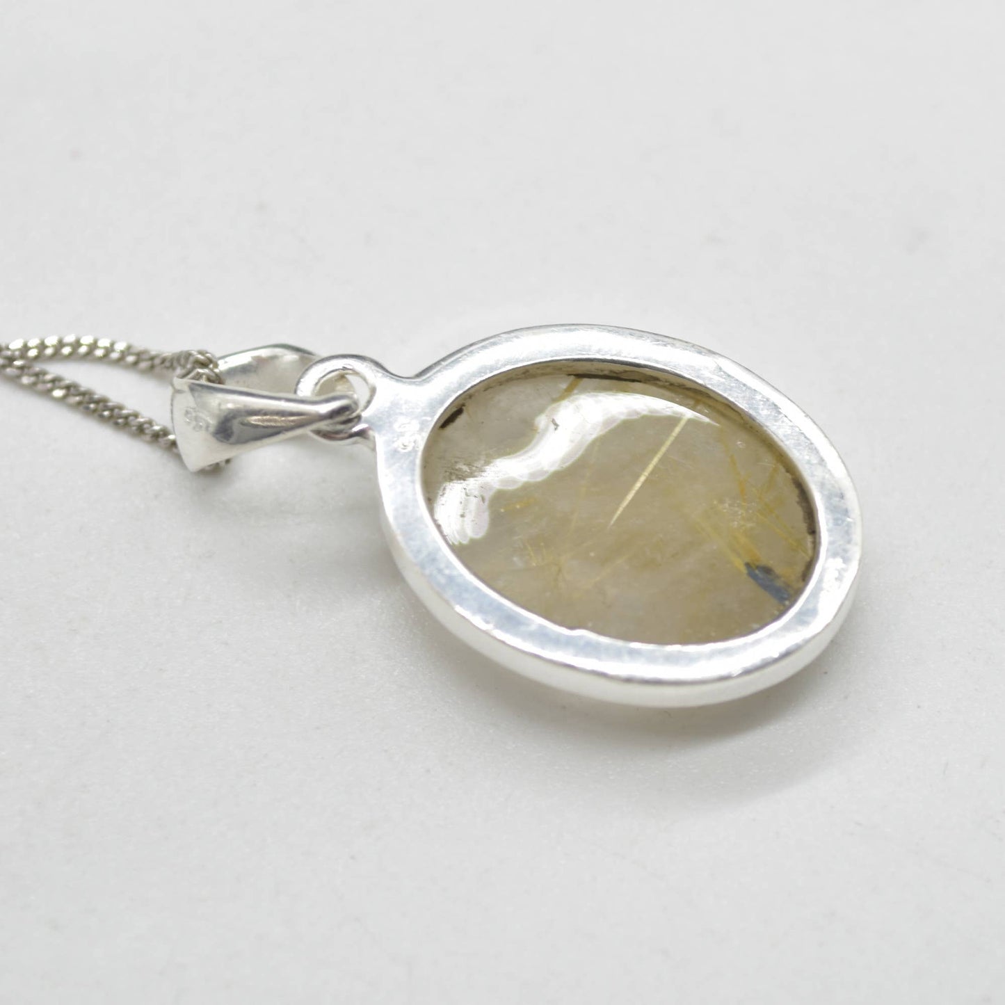 Golden Rutilated Quartz Oval Pendant in Sterling Silver