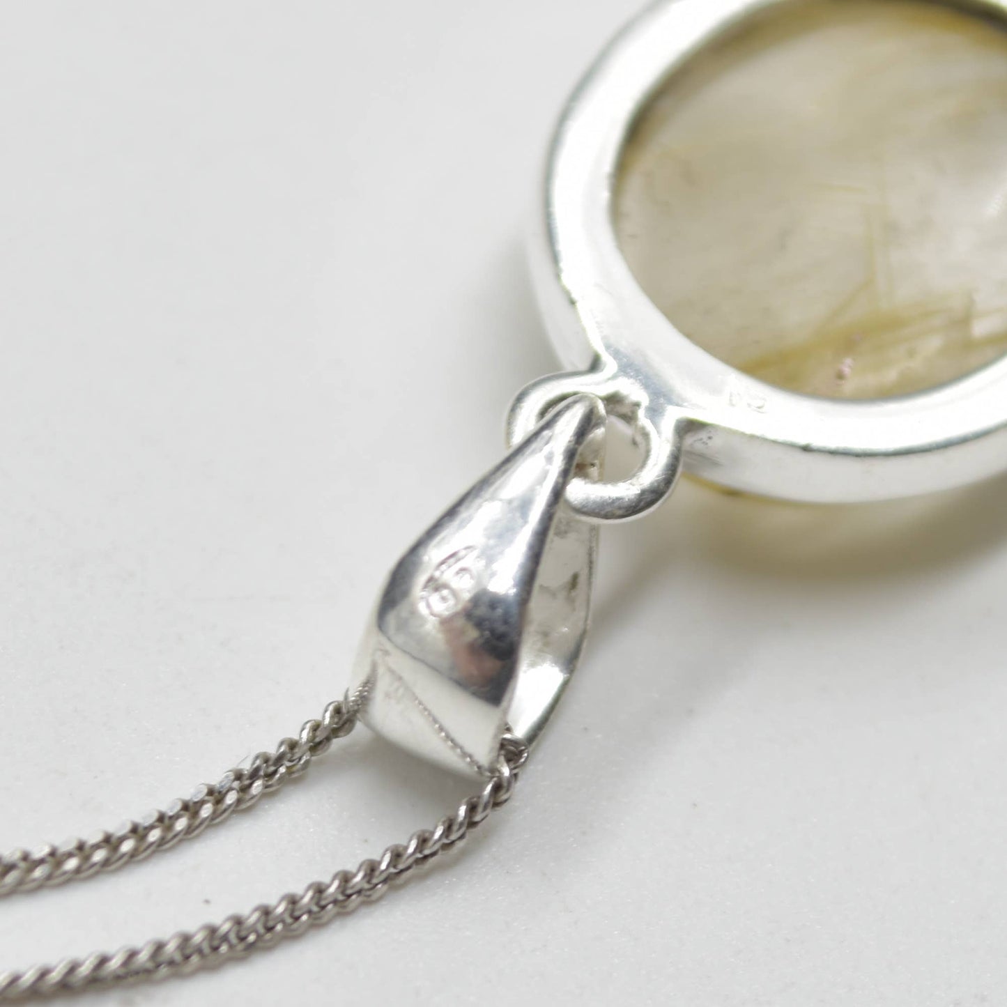 Golden Rutilated Quartz Oval Pendant in Sterling Silver