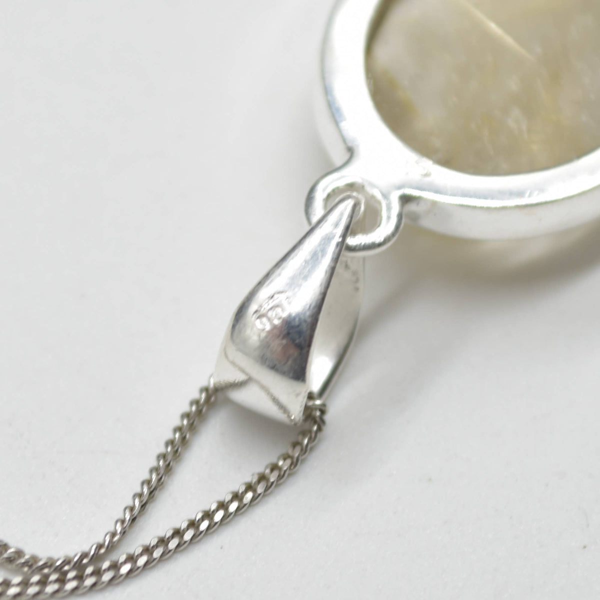Golden Rutilated Quartz Oval Pendant in Sterling Silver
