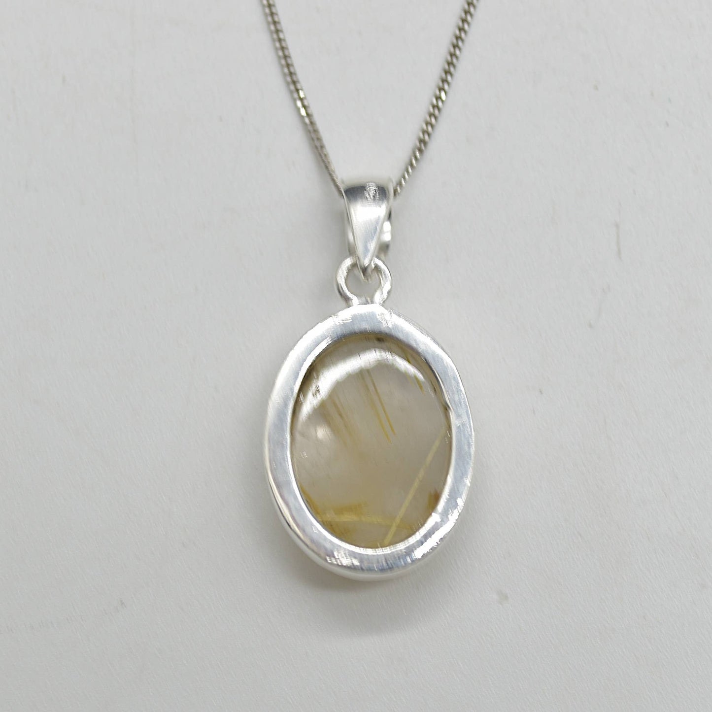 Golden Rutilated Quartz Oval Pendant in Sterling Silver