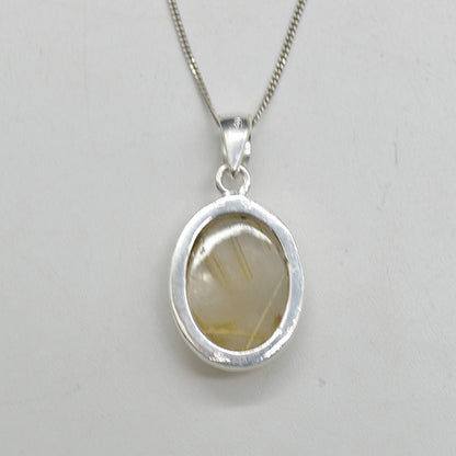 Golden Rutilated Quartz Oval Pendant in Sterling Silver